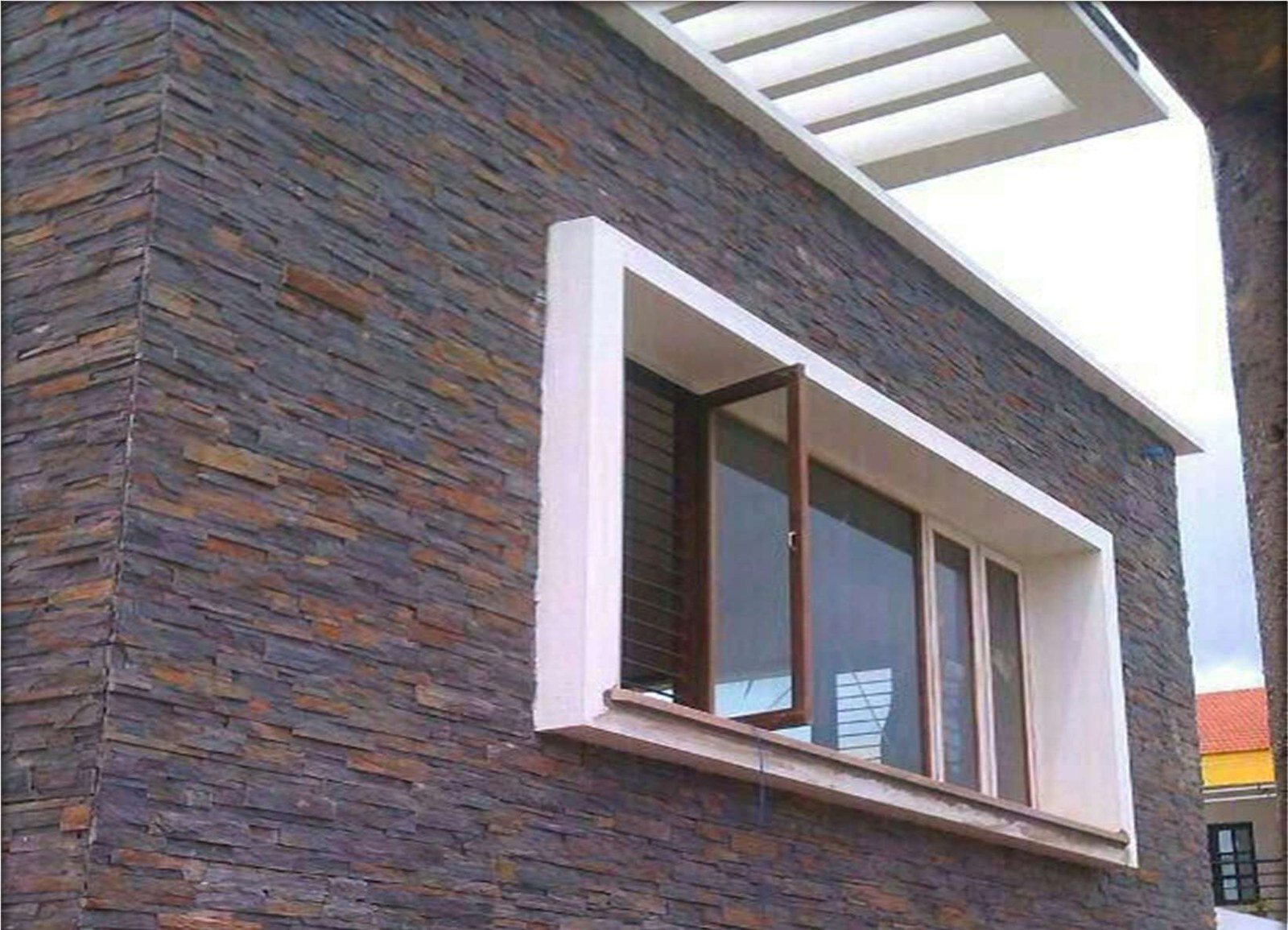 Khag Stone installed, 6x24" Slate cladding