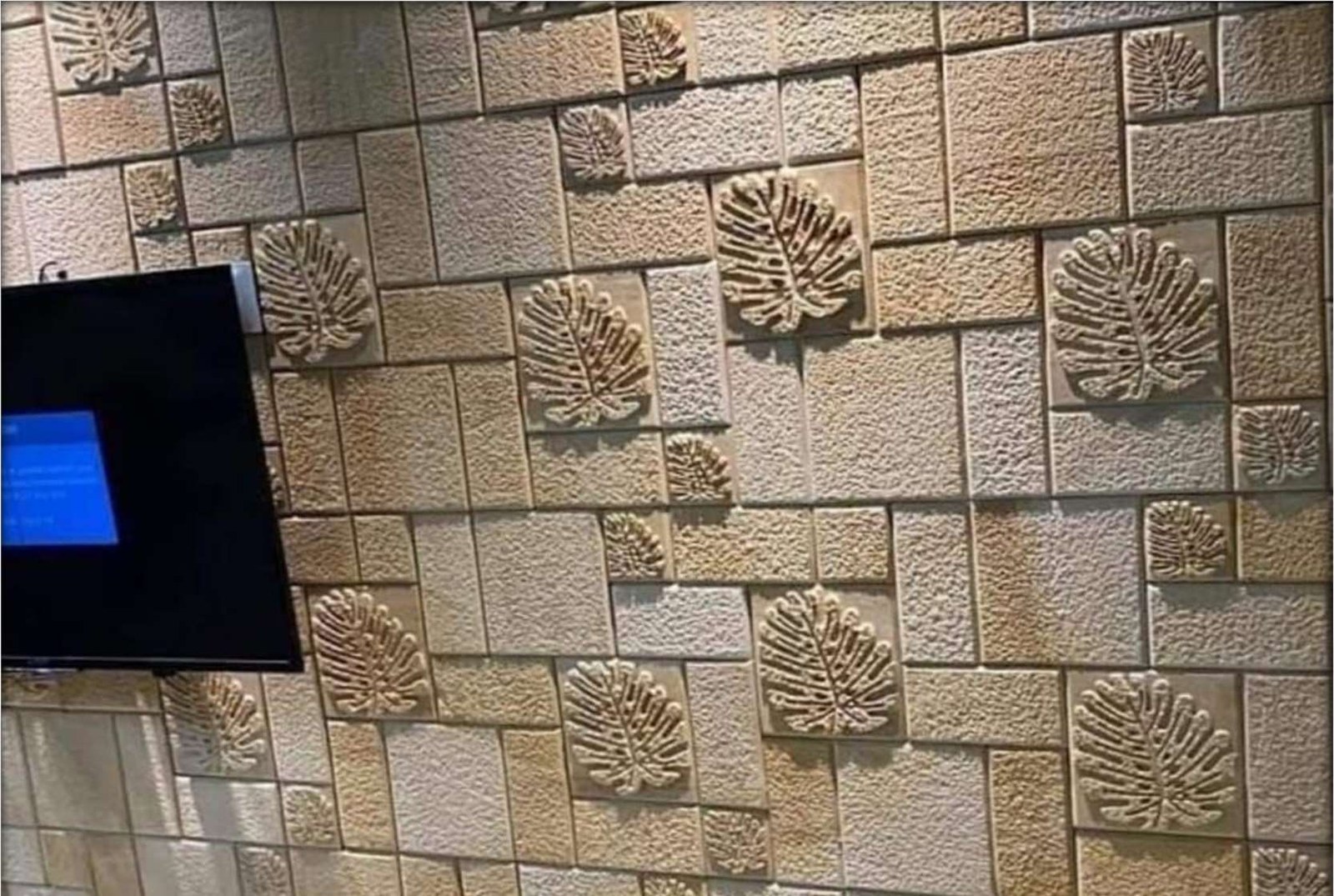 Teak Leaf installed, 12x12" Sandstone cladding