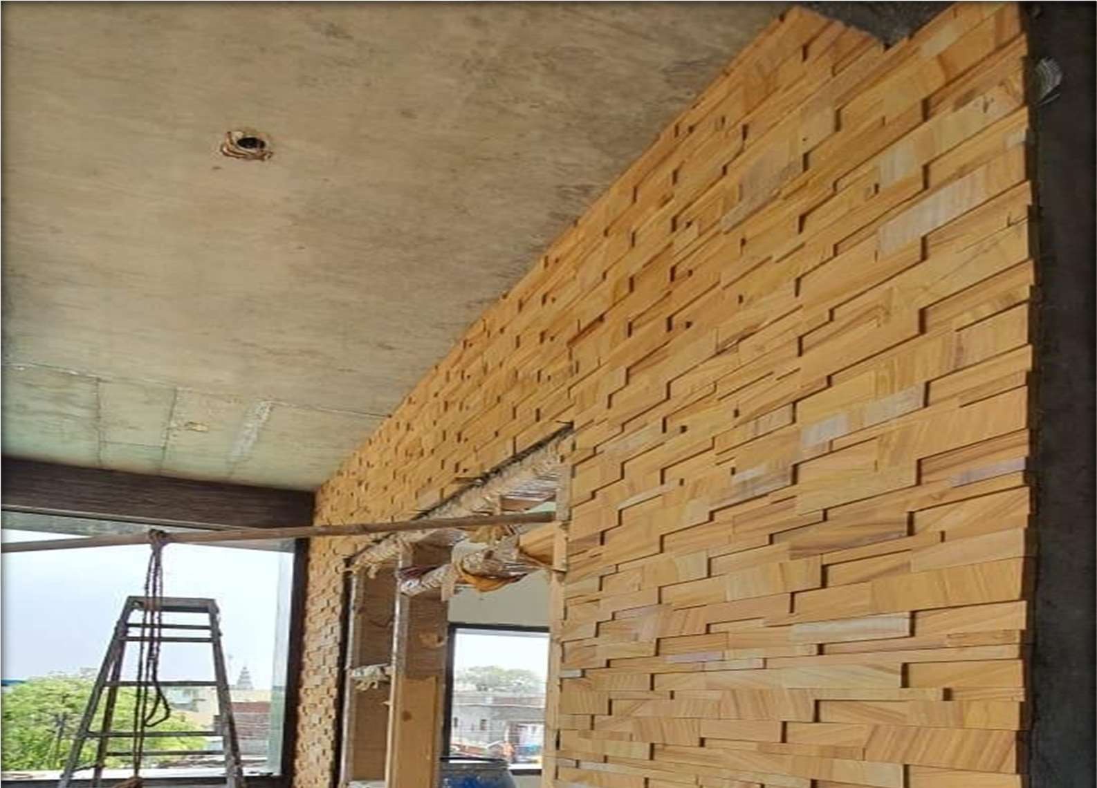 Teak Natural installed, 6x24" Sandstone cladding