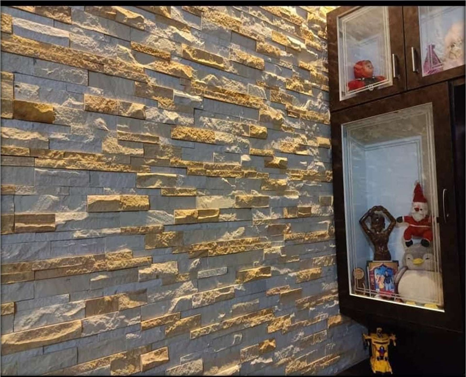 Natural stone wall cladding on an interior feature wall